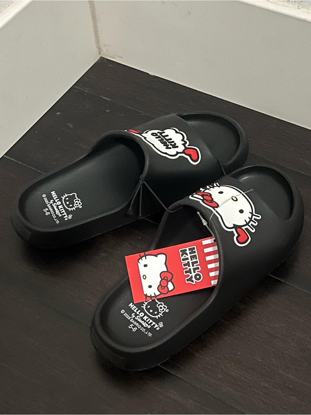 Hello Kitty Black Slide Sandals with Red Accents